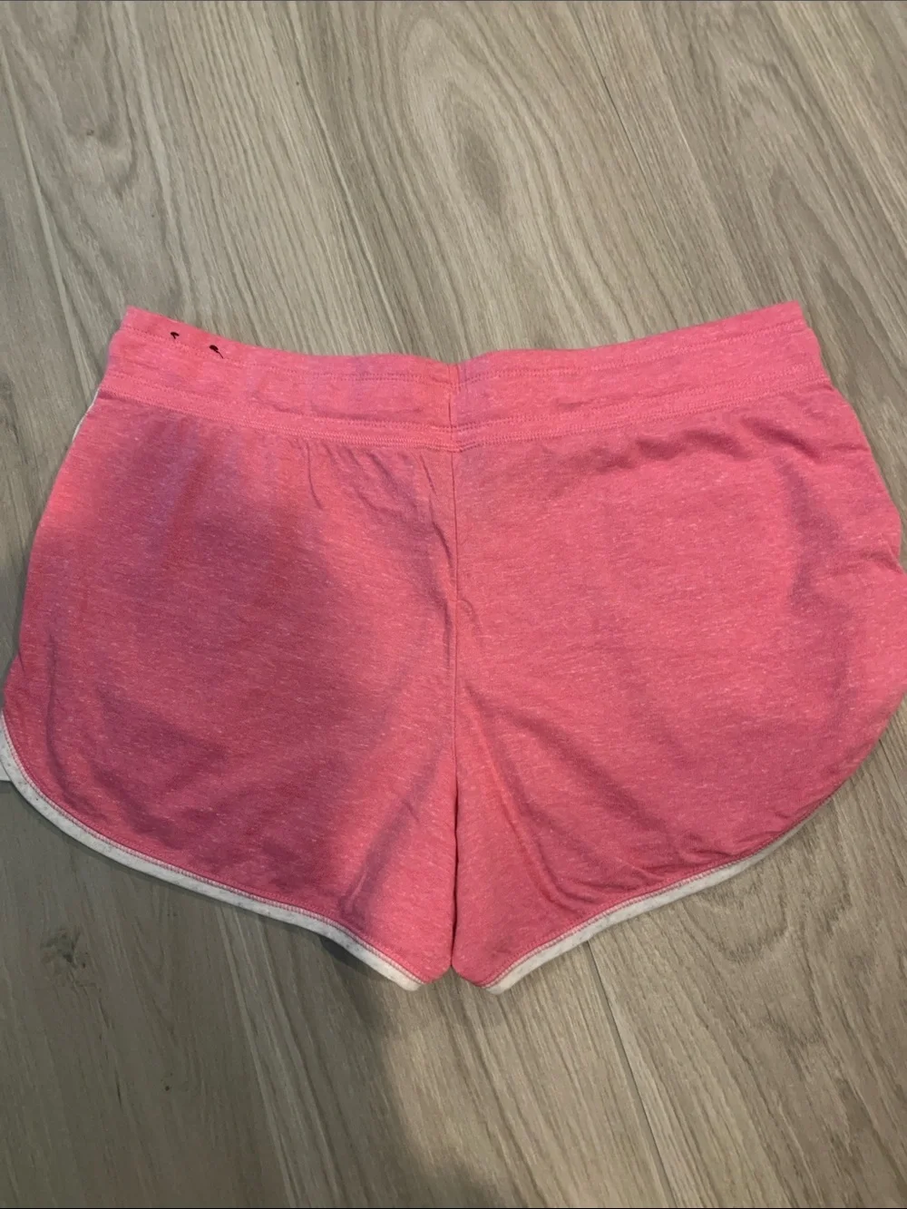 Nike Women's Coral Pink Athletic Shorts with White Trim